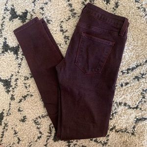 Maroon distressed skinny jeans